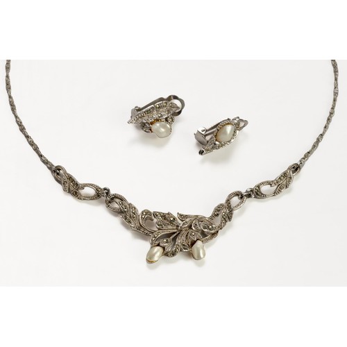 1179 - A SUITE OF SILVER AND MARCASITE JEWELLERY