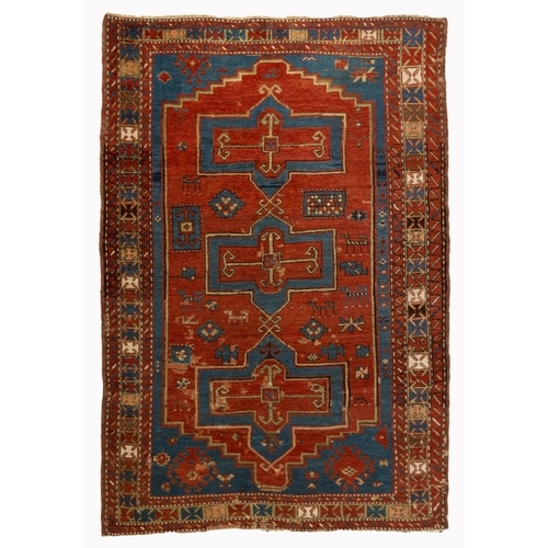 401 - AN ANTIQUE CAUCASIAN RUG 210 by 147cm