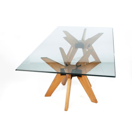 284 - A GLASS-TOPPED TABLE