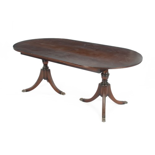 255 - A REGENCY-STYLE DINING TABLE