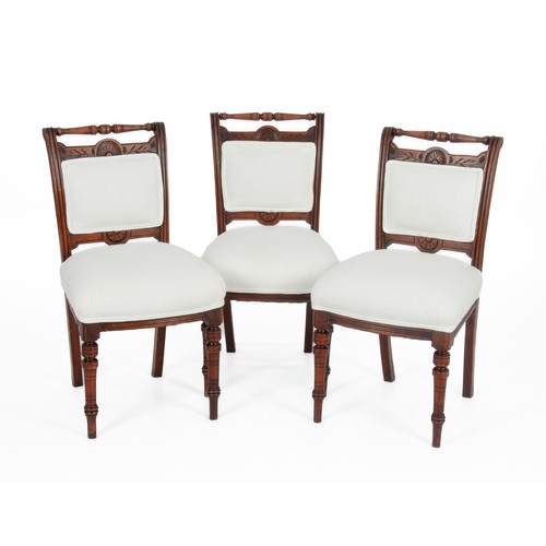 248 - A SET OF FOUR LATE VICTORIAN MAHOGANY AND UPHOLSTERED DINING CHAIRS