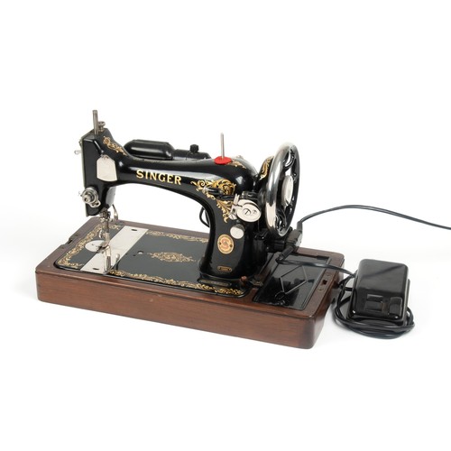 85 - A SINGER ELECTRIC SEWING MACHINE