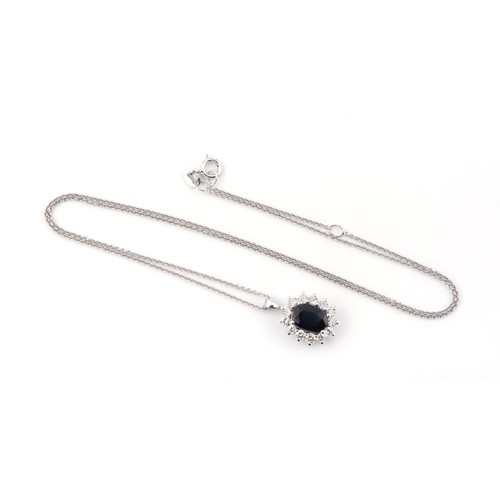 913 - A SAPPHIRE AND DIAMOND PENDANT