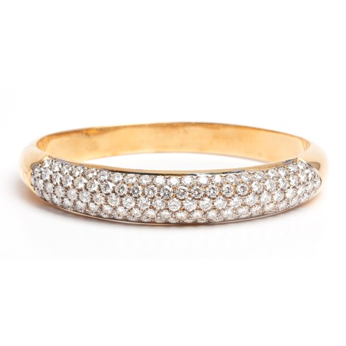 968 - A GOLD AND DIAMOND BANGLE, 7.50 CARATS