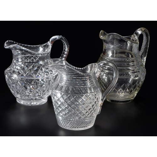 70 - THREE CUT-GLASS WATER JUGS