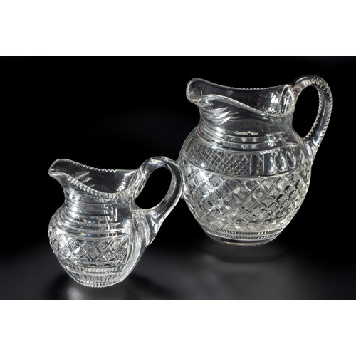 79 - TWO CUT-GLASS JUGS