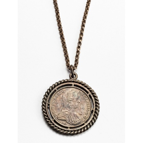 896 - A SILVER COIN PENDANT