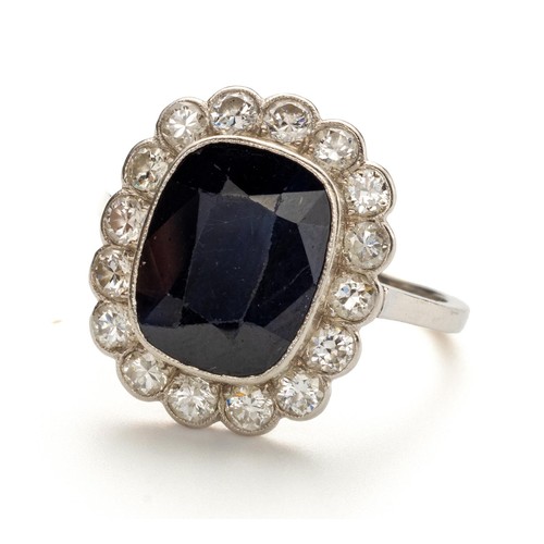 1026 - A SAPPHIRE AND DIAMOND RING