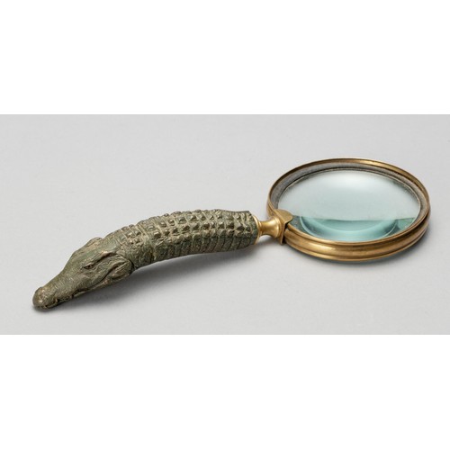 1202 - A BRASS AND BRONZE HANDLED MAGNIFYING GLASS, DONALD GREIG