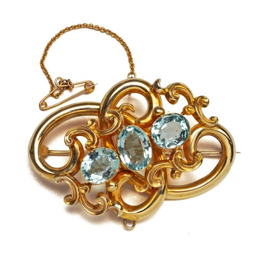 938 - A TOPAZ BROOCH