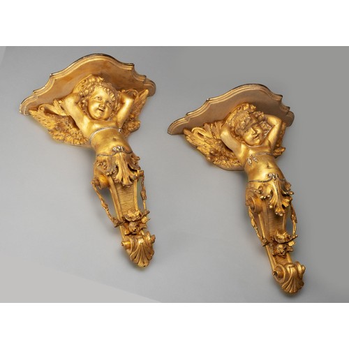 380 - A PAIR OF GILTWOOD WALL BRACKETS