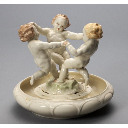 742 - A HUTSCHENREUTHER SELB PORCELAIN 'DANCING CHERUBS' FIGURAL GROUP AND BOWL