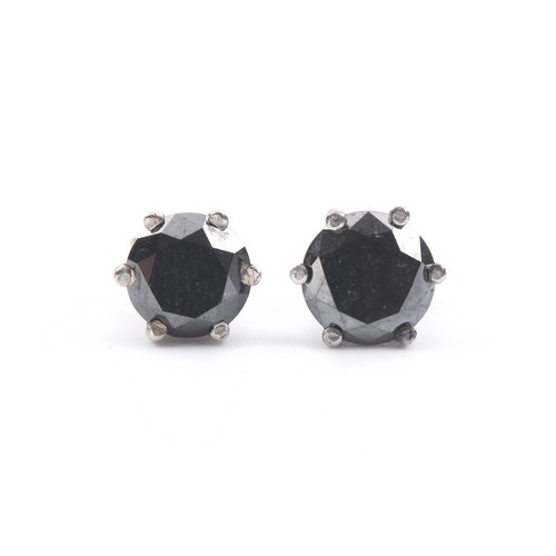 956 - A PAIR OF DIAMOND STUDS 1.00 CARATS