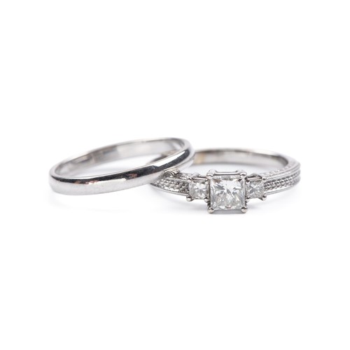 985 - A DIAMOND DRESS RING, 0.77 CARATS AND MATCHING BAND, GIA CERTIFIED