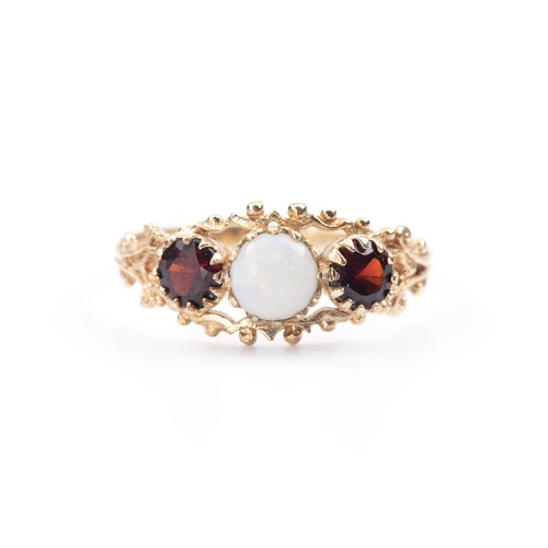 892 - AN OPAL AND GARNET RING