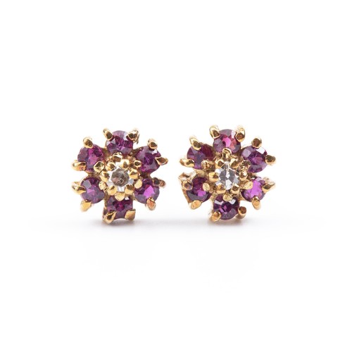 946 - A PAIR OF GARNET AND DIAMOND EARRINGS