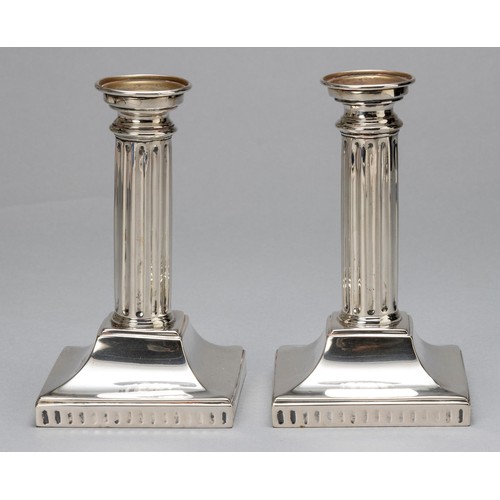 666 - A PAIR OF GERMAN SILVER CANDLESTICKS, OTTO SCHNEIDER, BERLIN, 19TH CENTURY