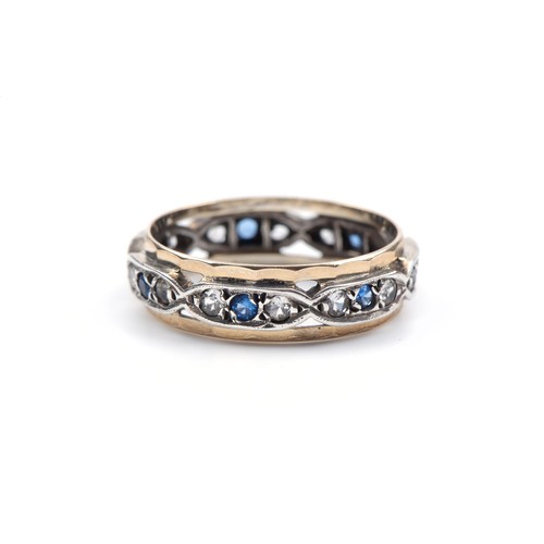 1028 - A SAPPHIRE AND DIAMOND ETERNITY STYLE DRESS RING