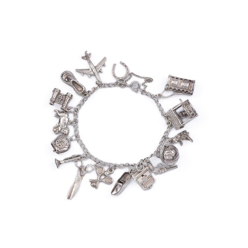 899 - A SILVER CHARM BRACELET