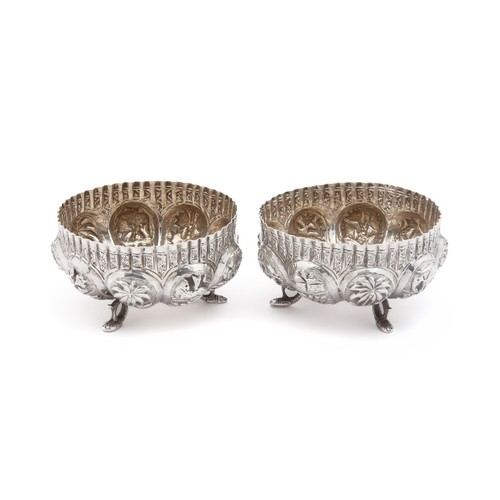 658 - A PAIR OF BURMESE SILVER SALTS, MAKER'S MARK RUBBED