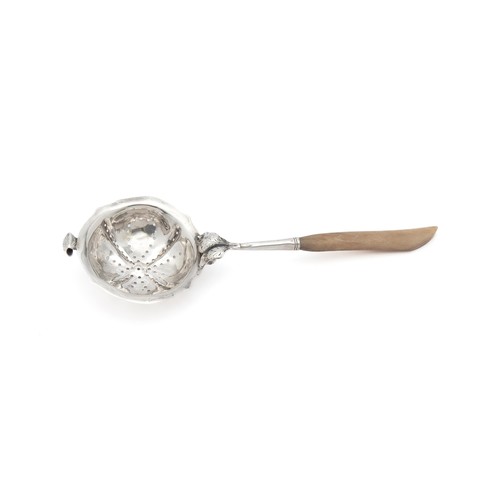 153 - A SILVER TEA STRAINER, MAKER AND DATE MARKS RUBBED