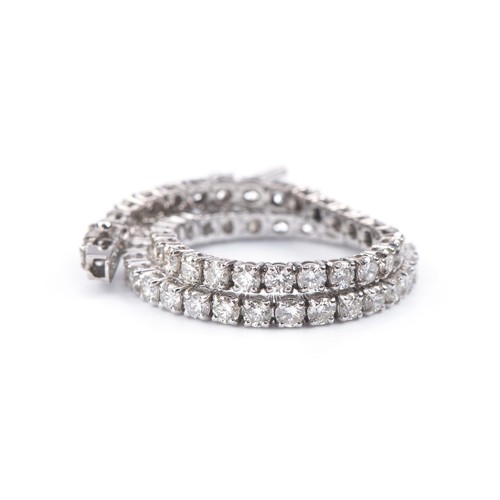 967 - A DIAMOND TENNIS BRACELET, 5.01 CARATS