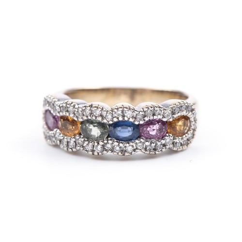 1042 - A GEMSTONE AND DIAMOND DRESS RING