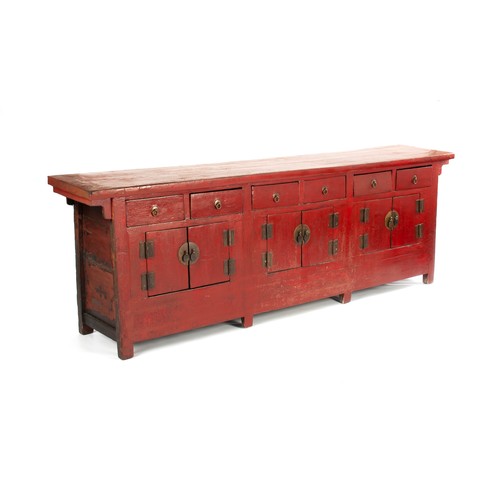 338 - A CHINESE RED LACQUERED STORAGE CABINET