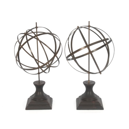 803 - A PAIR OF METAL ARMILLARY SPHERES