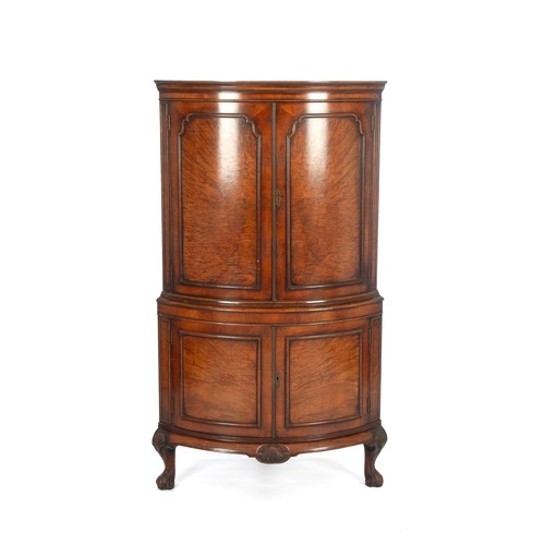 244 - A WALNUT CORNER COCKTAIL CABINET, 20TH CENTURY