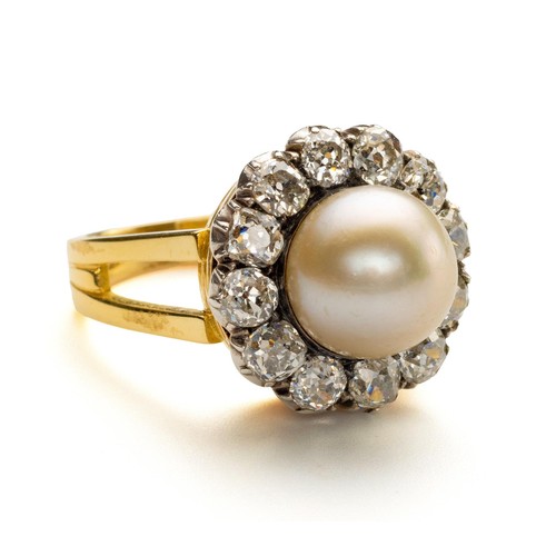 875 - A PEARL AND DIAMOND DRESS RING