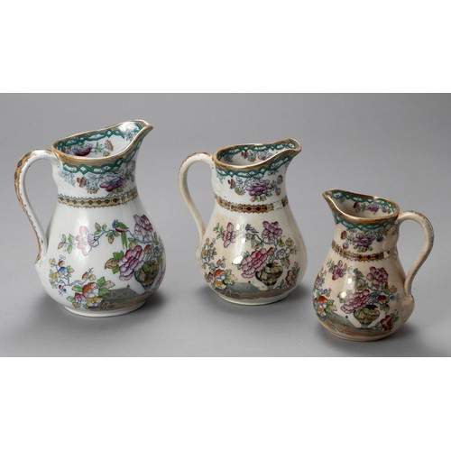 109 - A SET OF THREE JUGS