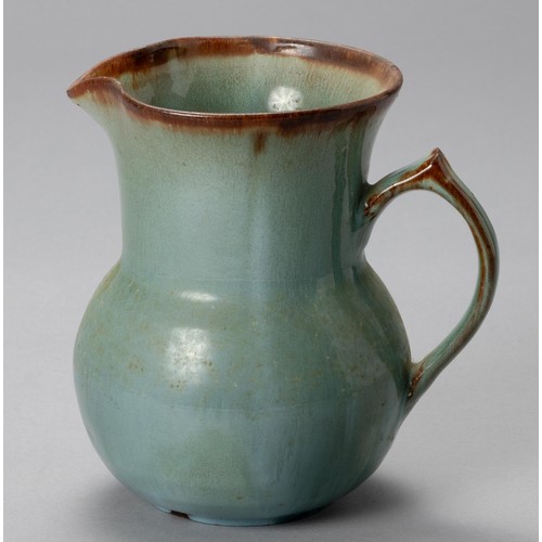 765 - A LINN WARE FERN-GREEN GLAZED JUG