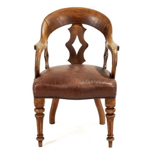 301 - AN OAK TUB ARMCHAIR