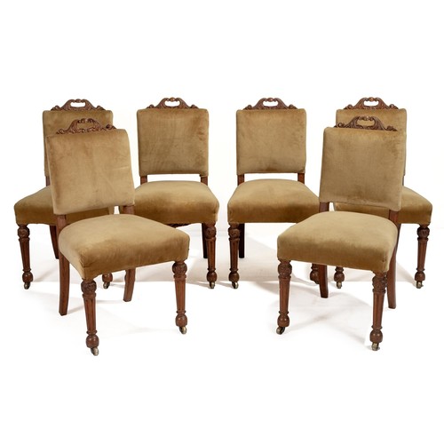 242 - A SET OF SIX MAHOGANY AND UPHOLSTERED DINING CHAIRS