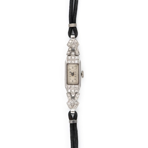 1121 - A LADIES DIAMOND WRISTWATCH, CYMA