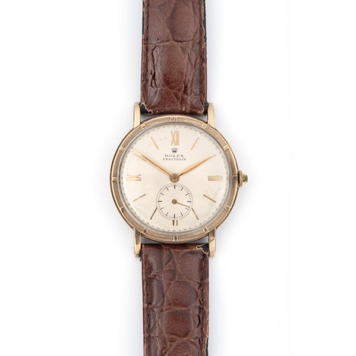 1124 - A GENTLEMAN'S GOLD WRISTWATCH, ROLEX PRECISION