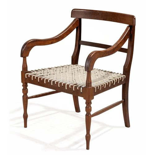 353 - A CAPE STINKWOOD REGENCY ARMCHAIR