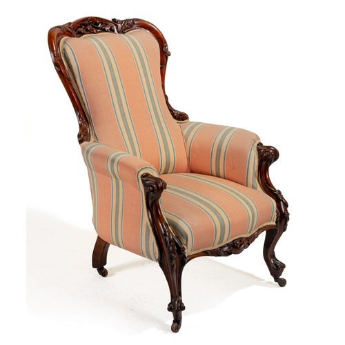 281 - A VICTORIAN MAHOGANY AND UPHOLSTERED ARMCHAIR