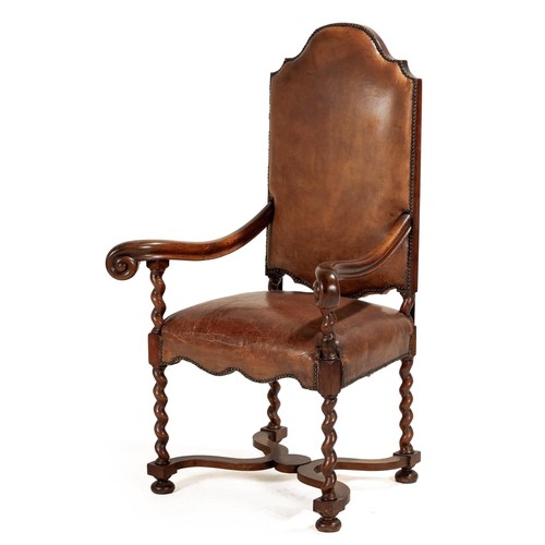 300 - A MAHOGANY AND LEATHER-UPHOLSTERED ARM CHAIR, 19TH CENTURY