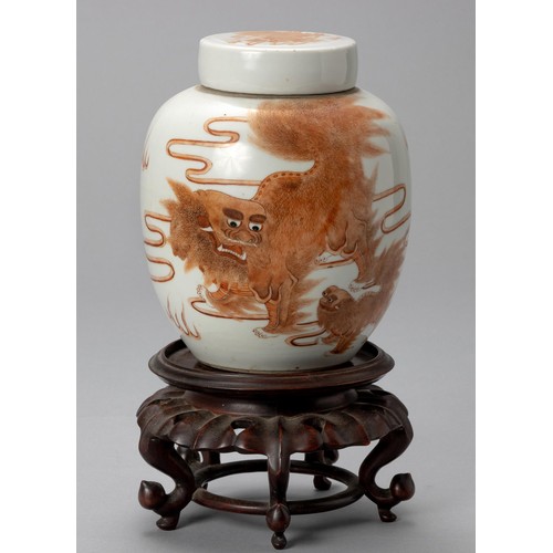 831 - A CHINESE FOO DOG GINGER JAR