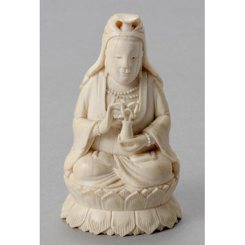 227 - A CHINESE CARVED FIGURE OF GUANYIN