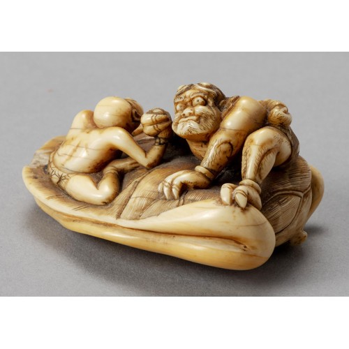 221 - A JAPANESE TUSK NETSUKE