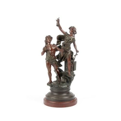 804 - A SPELTER GROUP OF A MALE AND FEMALE FIGURE HOLDING IMPLEMENTS