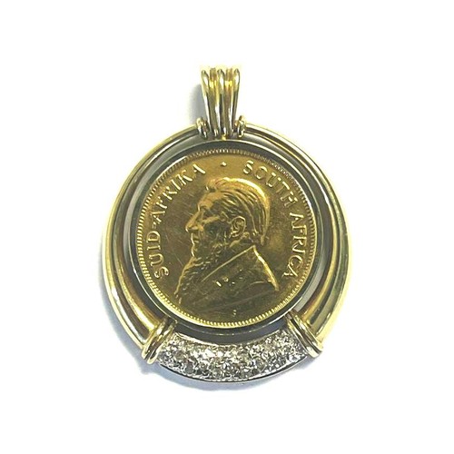 924 - A KRUGERRAND PENDANT