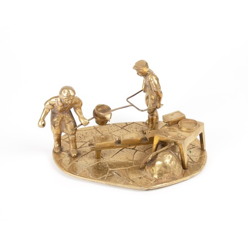 809 - A BRASS SCULPTURE OF A GROUP OF GOLD WORKERS