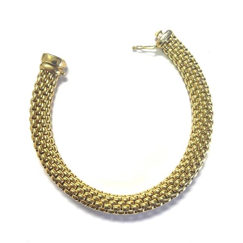 975 - A GOLD ROPE BRACELET, ITALY, CIRCA 1990