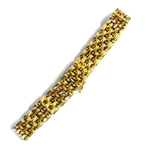 976 - A GOLD PANTHERE BRACELET, ITALY, CIRCA 1980