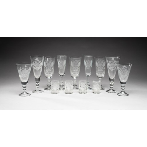 65 - A PART SUITE OF GLASSWARE ENGRAVED WITH A DOUBLE HEADED EAGLE