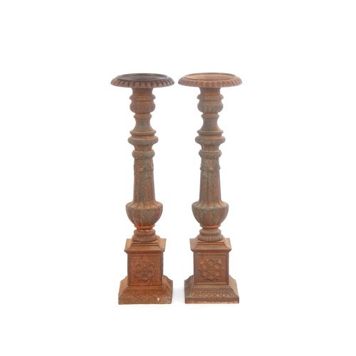 808 - A PAIR OF CAST-IRON PRICKET CANDLESTICKS